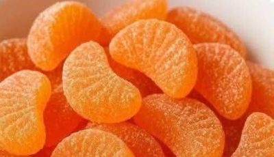 Orange Slice Candies with Powdered Sugar and Pecans